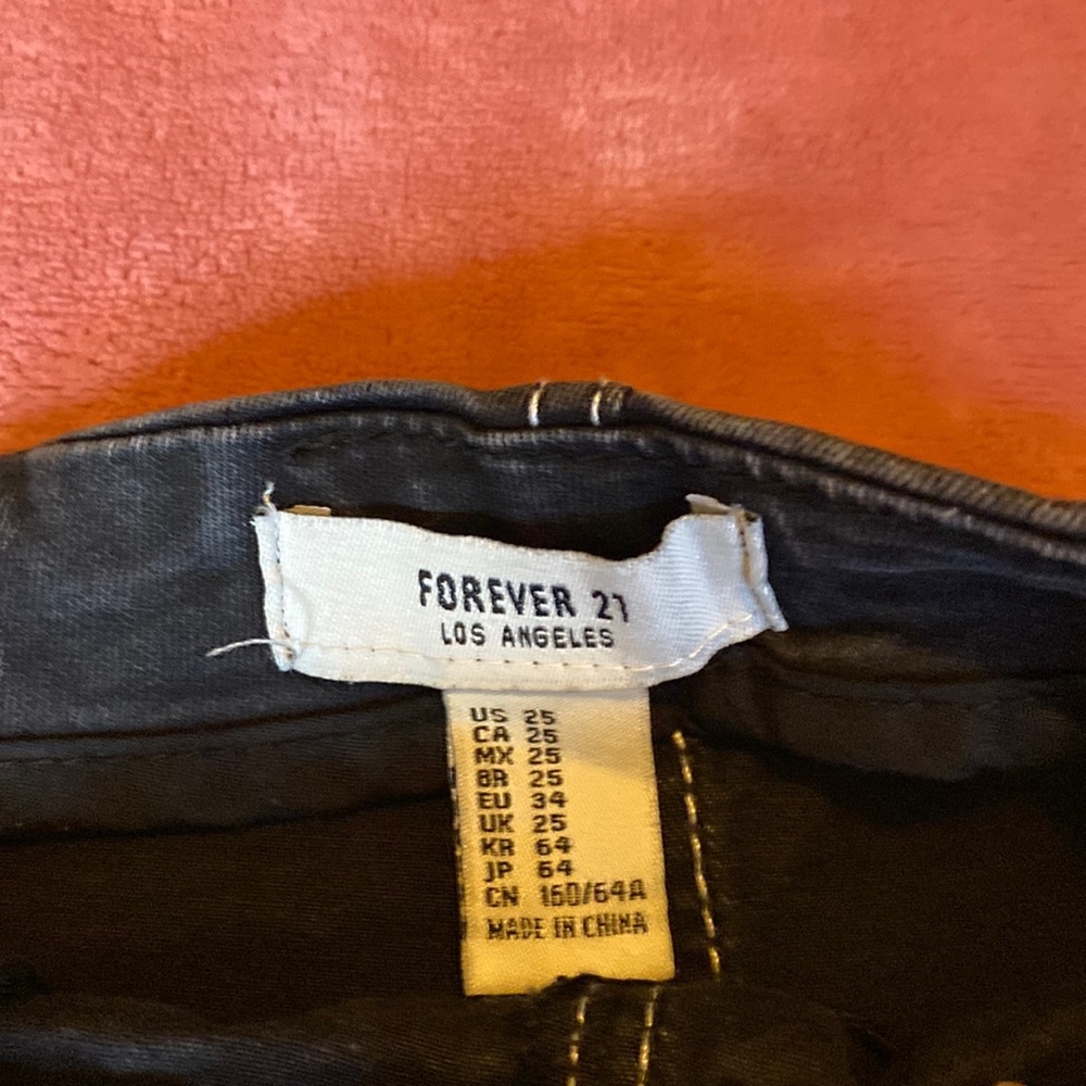 Black forever 21 skirt with white shipping. very petite. worn once.